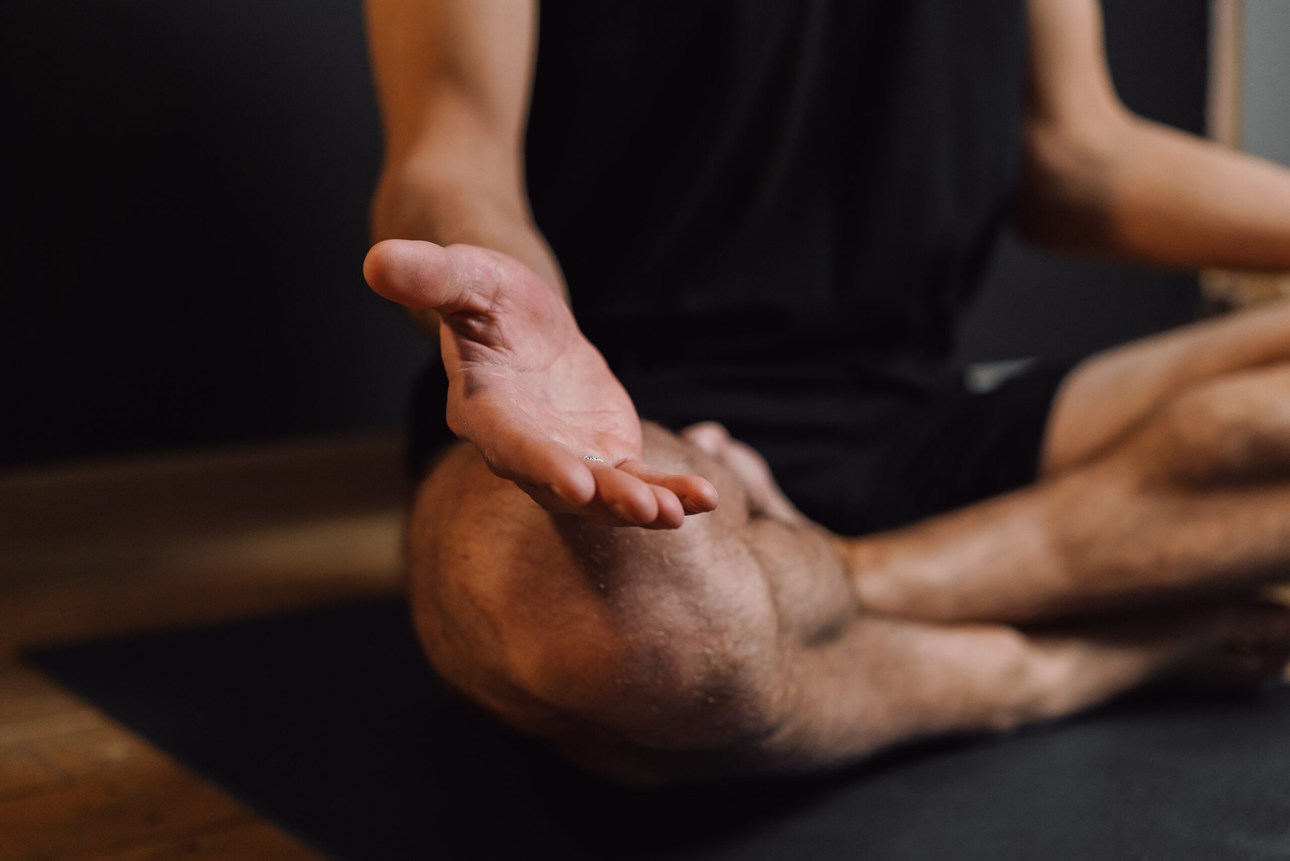 man in yoga position